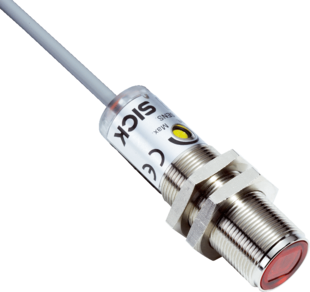 Capteur photoélectrique V180, forme M18, Sn=0-28m, NPN, L.ON/D.ON, 10-30VDC, LED rouge, laiton, dimensions (DxL)=M18x62.5mm, câble de raccordement 2m, 4 fils